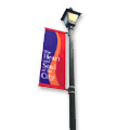 Picture of a vinyl banner hanging on an outdoor lamp post