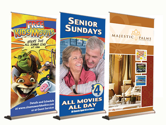 three custom vinyl banner signs